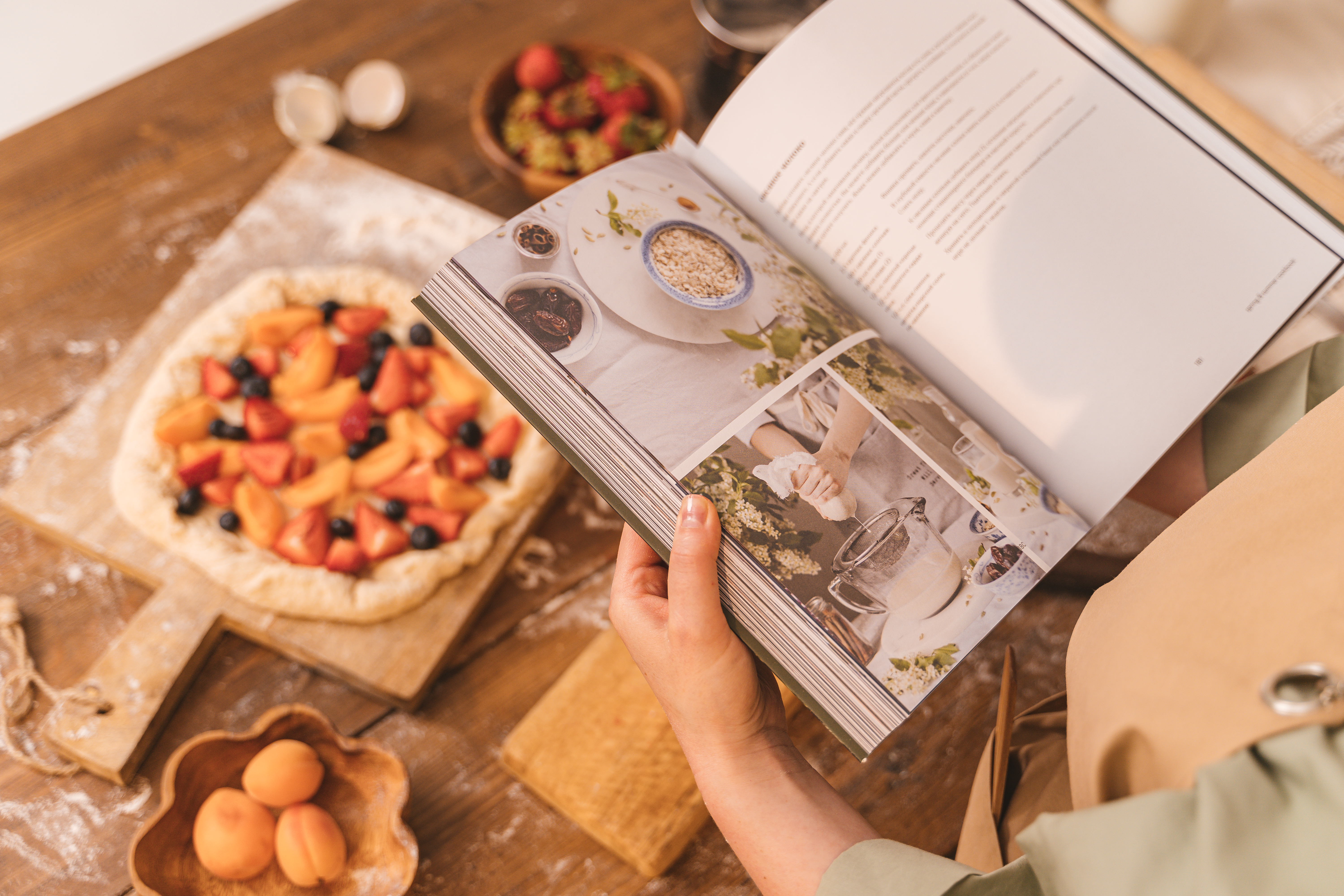Free Person Holding Cookbook Stock Photo